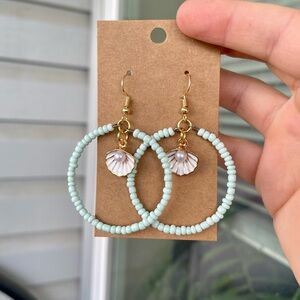 Pearl clam shell sage hoops